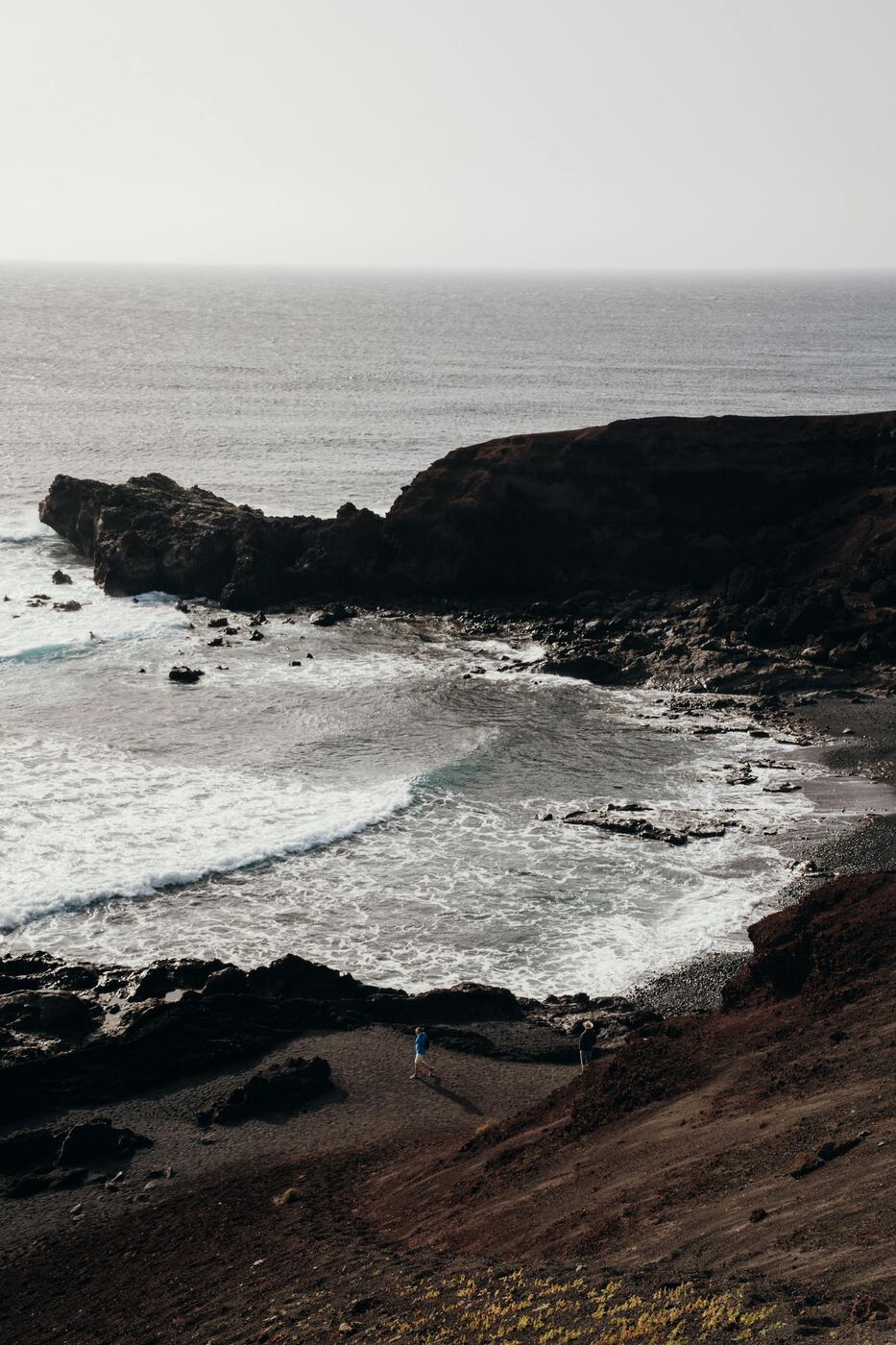 Rocky coastline typical of the wind-sheltered coves on the east coast of Lanzarote near Costa Teguise