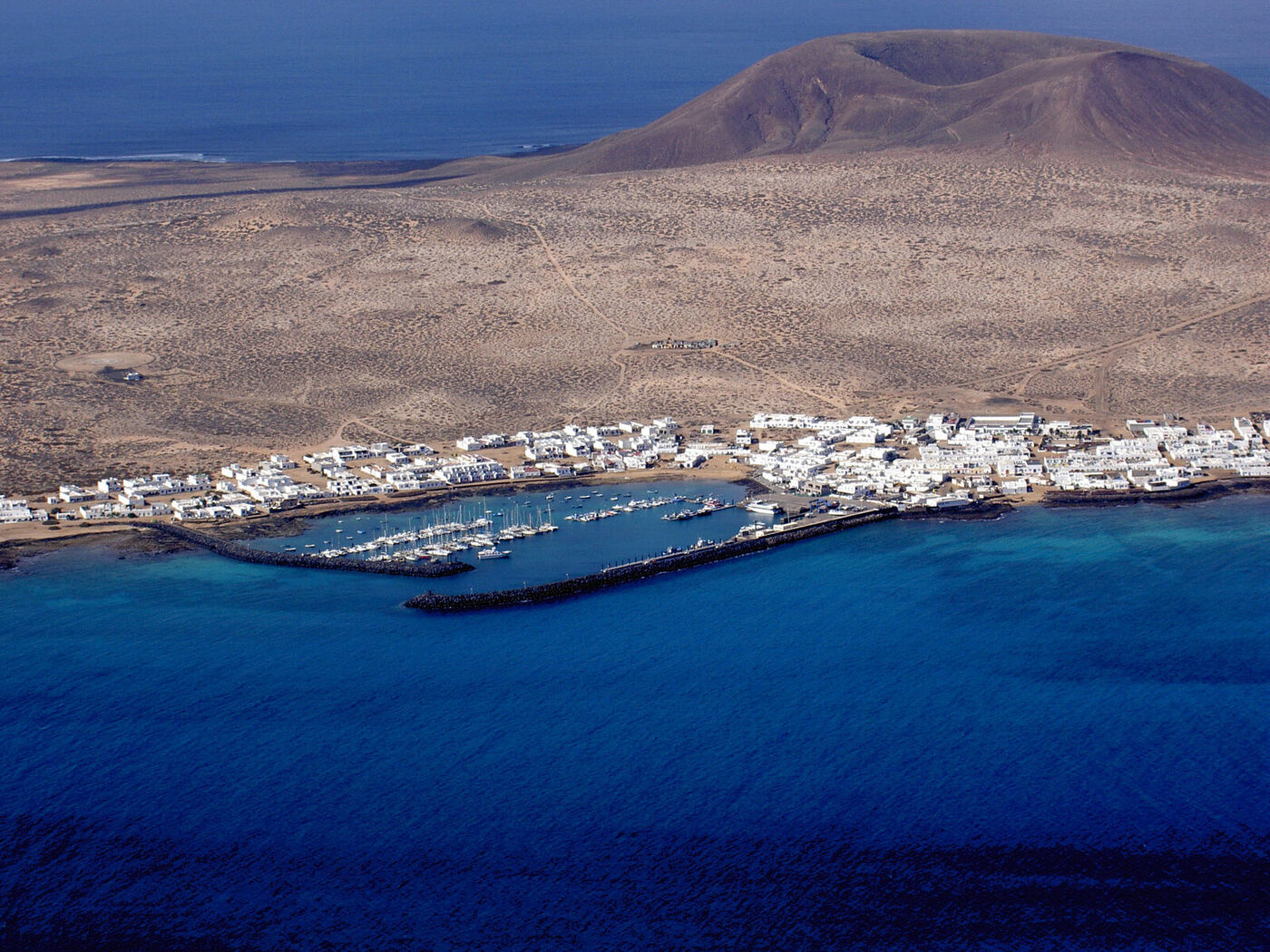 Whitewashed houses of Caleta del Sebo, the only permanent village on La Graciosa
