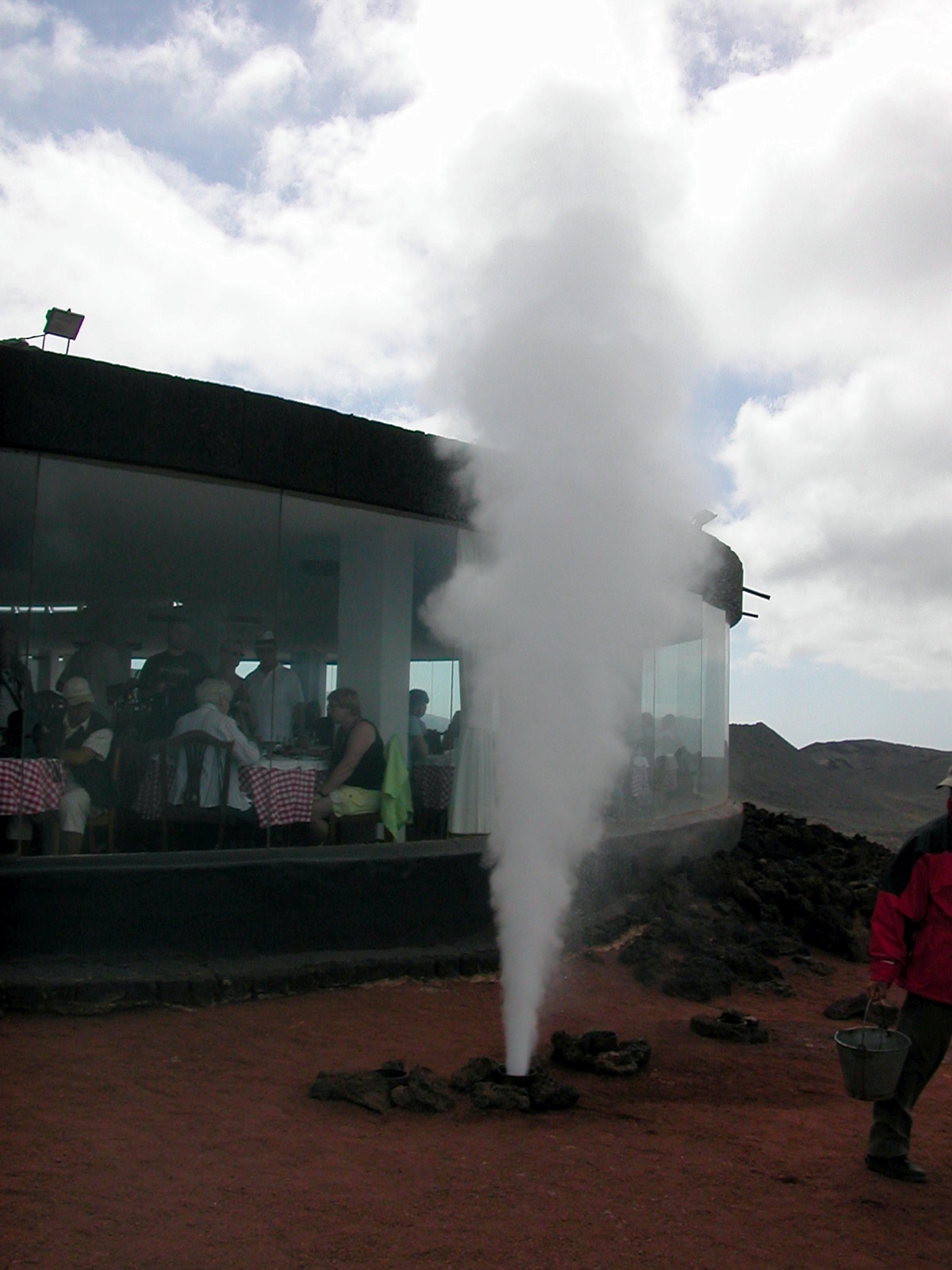 Geothermal geyser demonstration at Islote de Hilario in Timanfaya